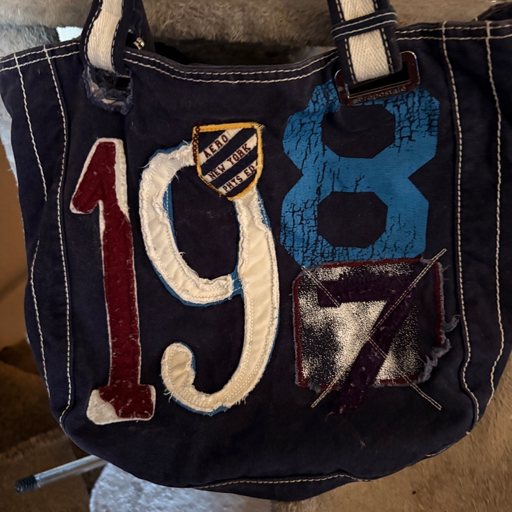 aéropostale
 Blue Canvas Tote Bag
  what year did you graduate from high school?